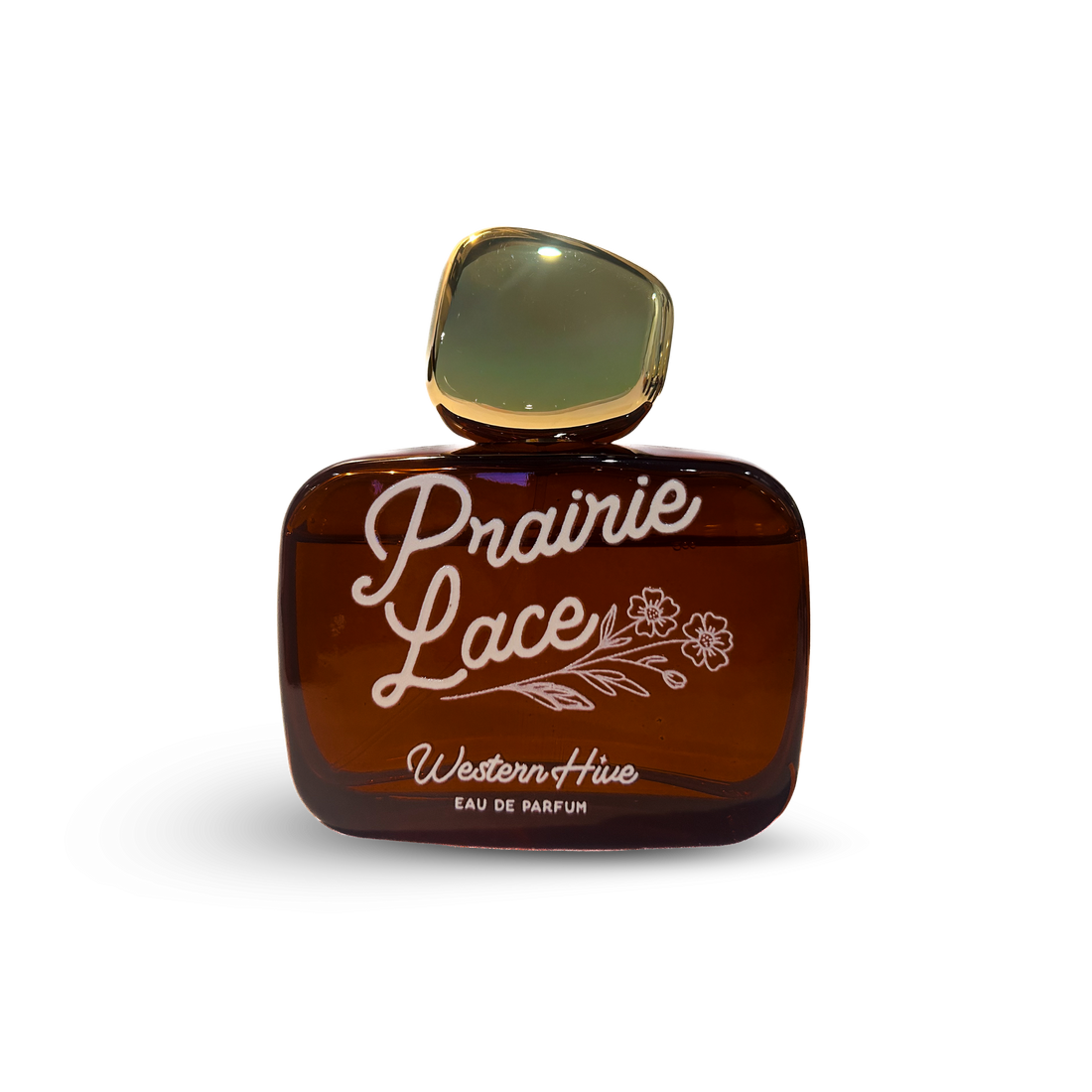 Prairie Lace 70ml cowgirl perfume by Western Hive featuring notes of green grass, vanilla cream, bergamot and wildflowers in an amber glass bottle